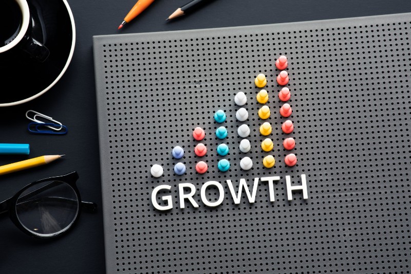 growth-text-with-pin-garph-chart-business-table (1)